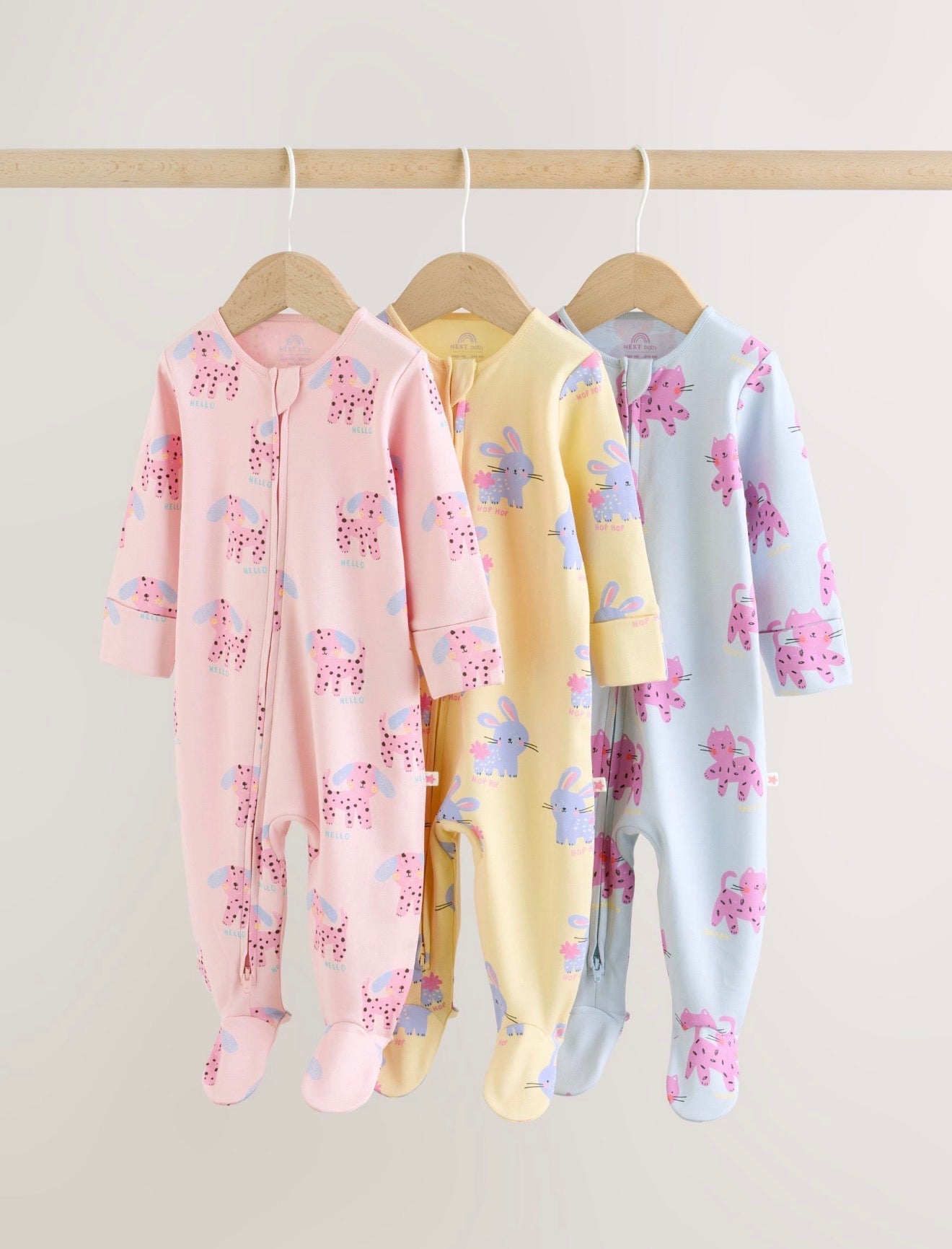 Pink / Yellow character Two Way Zip sleepsuits